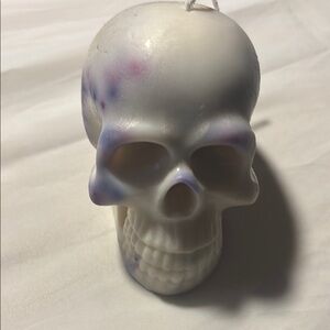 Unique Skull Candle with White and Purple Hues